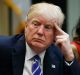 President Donald Trump listens during a meeting with women small business owners in the Roosevelt Room of the White ...