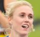 Sally Pearson celebrates after competing in the Open Womens Preliminary 100m Hurdles event.