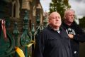 Clergy sexual abuse survivors Tony Wardley and Dominic Ridsdale outside St Alipius church.