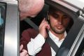 As he was leaving the station, Salim Mehajer was asked to leave another taxi by police.