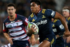 White-line fever: Malakai Fekitoa heads for the try line.