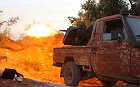 Members of al Qaeda's Nusra Front fire their weapon during an offensive to take control of the northwestern city of Ariha