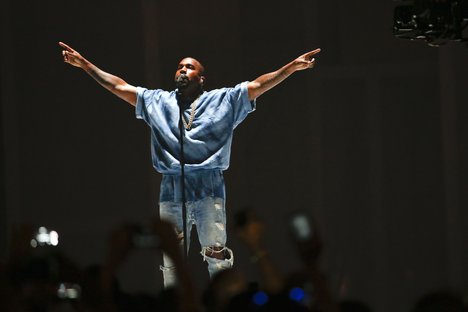 Kanye West performs during the closing ceremony of the Pan Am Games Sunday, July 26, 2015, in Toronto.