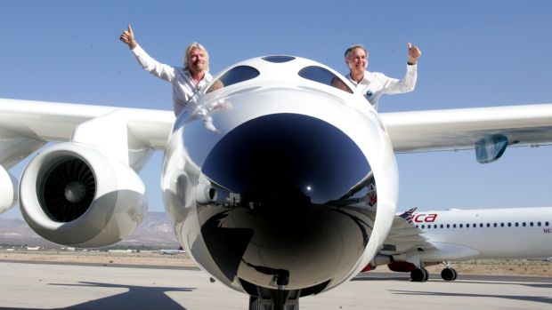 Richard Branson, left, in his concept craft, SpaceShipTwo.