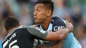 SYDNEY, AUSTRALIA - APRIL 02: David Havili of the Crusaders tackles Israel Folau of the Waratahs during the round six ...