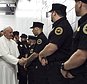 FILE - In a Sunday, Sept. 27, 2015 file photo, Pope Francis greets corrections officers at the Curran-Fromhold Correctional Facility in Philadelphia, during his visit there. A New Jersey teenager has admitted plotting to kill Pope Francis when he visited Philadelphia in 2015. Seventeen-year-old Santos Colon Jr. pleaded guilty as an adult Monday, April 3, 2017, to attempting to provide material support to terrorists. The Lindenwold resident faces up to 15 years in prison. (Todd Heisler/The New York Times, Pool)