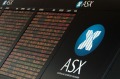 The Australian sharemarket trended slightly lower on Tuesday after a dour night on Wall Street, with banks leading the ...