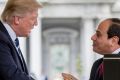 President Donald Trump greets Egyptian President Abdel Fattah Al-Sisi as he arrives at the White House in Washington.