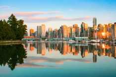 Beautiful view of Vancouver skyline with Stanley Park at sunset, British Columbia, Canada