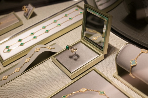 The Perlee yellow gold diamond and malachite between-the-finger ring, among pieces from the Vintage Alhambra collection.