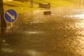 Auckland roads flood as the remnants of Cyclone Debbie moves across the country. 