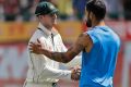 Steve Smith shakes hands with Indian counterpart Virat Kohli after the conclusion of the fourth and final Test on Tuesday.