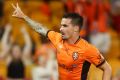 One more to come: Jamie Maclaren celebrates his second goal.