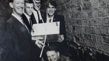 Students with the satellite payload.