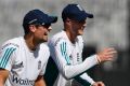 Alastair Cook and Joe Root share a laugh in India.