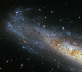 File - This image from Hubble’s Wide Field Camera 3 (WFC3) shows a section of NGC 1448, a spiral galaxy located about 50 million light-years from Earth in the little-known constellation of Horologium (The Pendulum Clock).