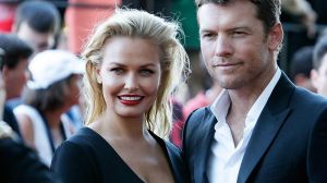 Lara Bingle and Sam Worthington arrive at the 3rd Annual AACTA Awards Ceremony at The Star in 2014.