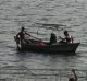 Indians ride on boats in the River Ganges, in Allahabad, India, Tuesday, March 21, 2017. The Ganges and the Yamuna, two ...