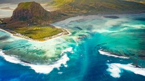 The amazing "underwater waterfall" effect can be seen from the air looking back towards Le Morne.