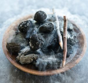 Plating like the dark nemesis of Donna Hay: Charcoal-dusted chocolate truffles.