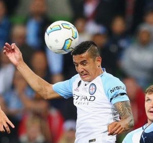 Match winner: Tim Cahill heads the ball in for a goal against Sydney FC in the FFA Cup final. 