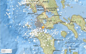 A trio of strong earthquakes damaged buildings and caused panicked tourists to flee a popular dive resort near the Philippine resort province south of Manila.