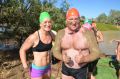 Jackie and Ben enjoy the mud of the Eastern Creek ahead of Saturday's Dirt N Dust triathlon.