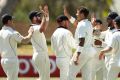 James Pattinson of the Bushrangers celebrates with teammates.