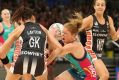 Midcourt battle: Vixen Tegan Philip holds out against Magpie Sharni Layton.