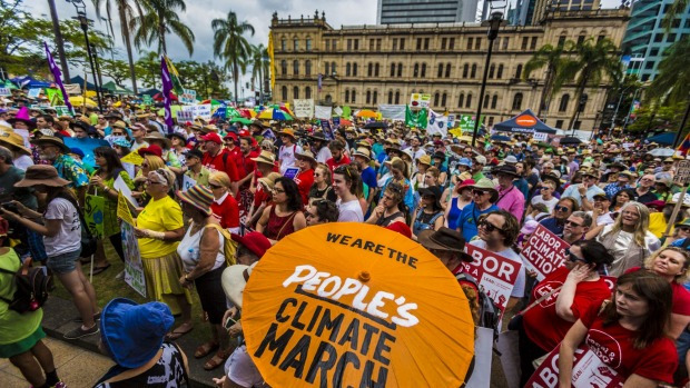 Crowds at the People's Climate March through Brisbane. Photo: Glenn Hunt Read more: http://www.smh.com.au/environment/un-climate-conference/thousands-march-in-brisbane-for-climate-change-action-20151128-glahpd.html#ixzz3x0WMblfx Follow us: @smh on Twitter | sydneymorningherald on Facebook