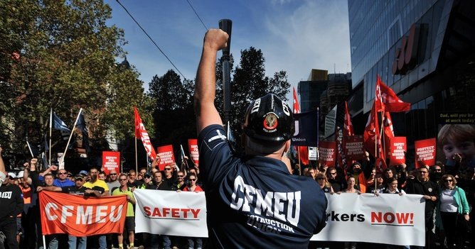 Construction workers march in the city centre in Melbourne, Tuesday, April 30, 2013. The CFMEU today marched on Grocon sites calling for improved safety. (AAP Image/Julian Smith) NO ARCHIVING