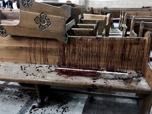 Blood stains pews inside the St. George Church after a suicide bombing, in the Nile Delta town of Tanta, Egypt, Sunday, April 9, 2017.