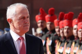 Australian Prime Minister Malcolm Turnbull is received by Indian Prime Minister Narendra Modi at a ceremonial welcome at ...