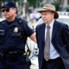 James Hansen being arrested at a protest against the Keystone XL pipeline, which he calls the fuse to the biggest carbon bomb on the planet," because it would carry tar sands crude. 