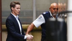 Oliver Curtis being escorted to a prison truck on June 24, 2016.