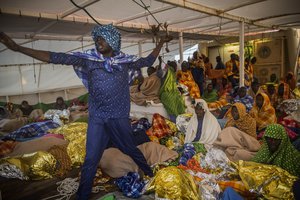 File - Refugees and migrants from different African nationalities and Bangladeshis, rest aboard Golfo Azurro, the Spanish NGO Proactiva Open Arms rescue ship, after being rescued off the Libyan coast when they were trying to reach Europe, early Sunday, March 5, 2017.