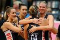 SYDNEY, AUSTRALIA - MARCH 26: Caitlin Thwaites of the Magpies embraces teammate Cody Lange after the round six Super ...