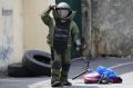 A Philippine bomb squad member during an anti-terror exercise in Quezon city, north of Manila, on Tuesday.