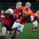 Down's Tiarnan Ruse in action against Armagh's Paul Quinn during the Ulster U21FC quarter-finals.