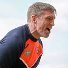 Sheer agony: Armagh boss Kieren McGeeney feels the pain of defeat