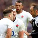 Listen up: I shall say this only once, Romain Poite remains calm as he talks to two members of England’s brains trust