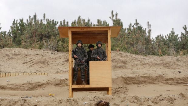 South Korean marine soldiers stand guard during joint US-South Korea exercises in Pohang, South Korea on Tuesday.