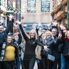 Belfast Food Tour founder Caroline Wilson, with a group on the Tour