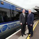 Pictured is Paul McGrattan, Information Services & Technology Manager, Translink (left) with Brian McCormick, Account Director at BT Business in Northern Ireland.