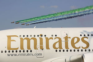 Plane with "Emirates" written on the side