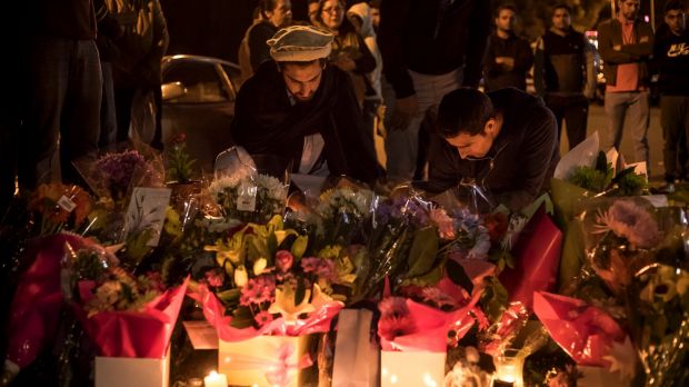 Maaz Yousafzai, left, at the candlelight vigil.