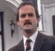 John Cleese as his iconic character Basil Fawlty in Fawlty Towers.