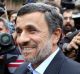 Former Iranian President Mahmoud Ahmadinejad arrives at the Interior Ministry to register his candidacy for the upcoming ...