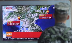 FILE - In this Sept. 9, 2016 file photo, a South Korean marine watches a TV screen reporting about North Korea's possible nuclear test at the Seoul Railway Station in Seoul, South Korea. North Korea has conducted five nuclear tests, the first in 2006.