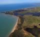 A picture of the Abbot Point coal loading facility showing coal water run-off moving north-west into the wetlands and ...